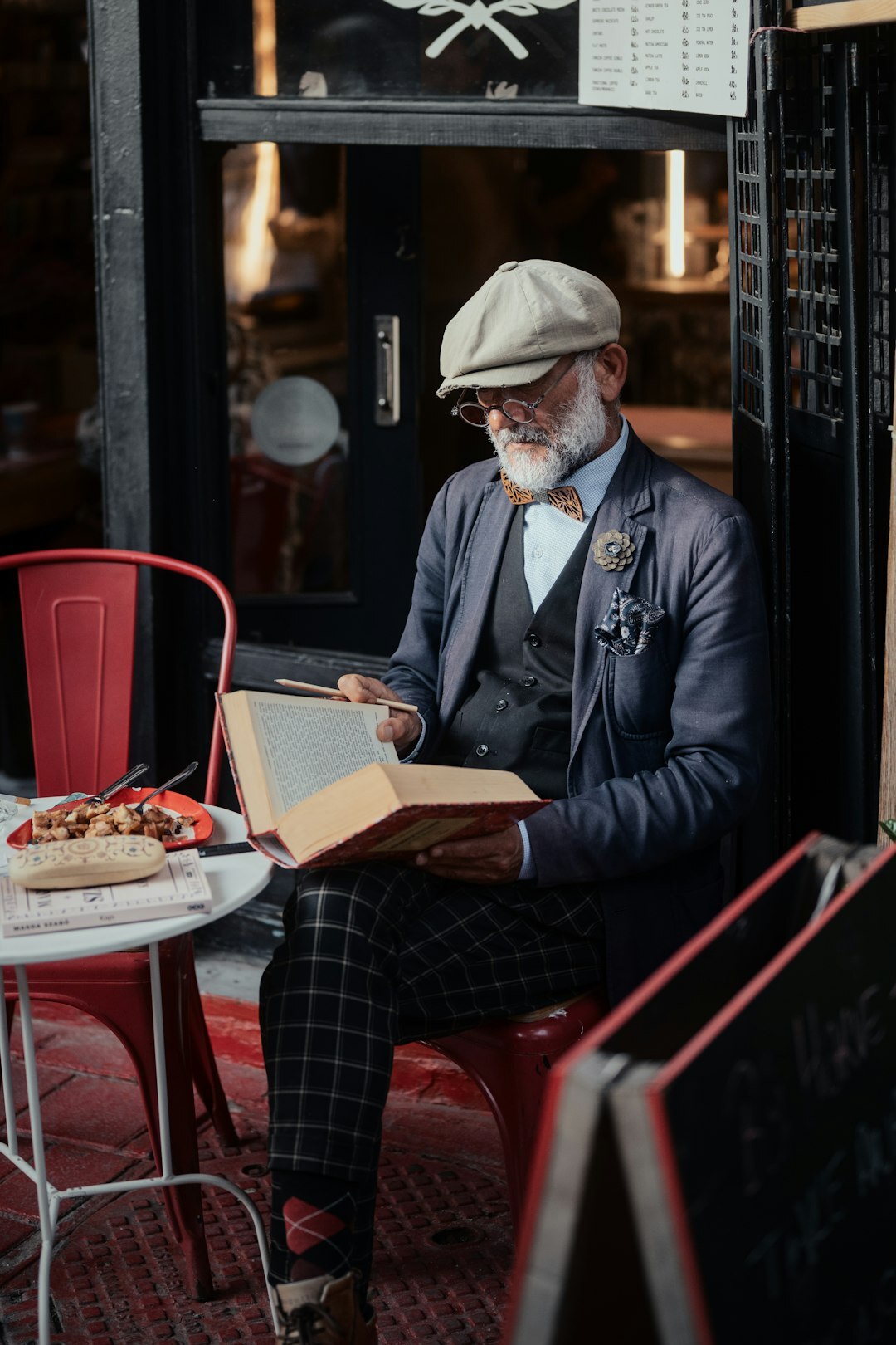 detective reading old book